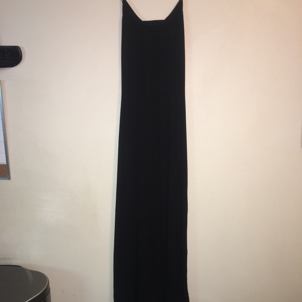 Express black maxi with cut out in back .